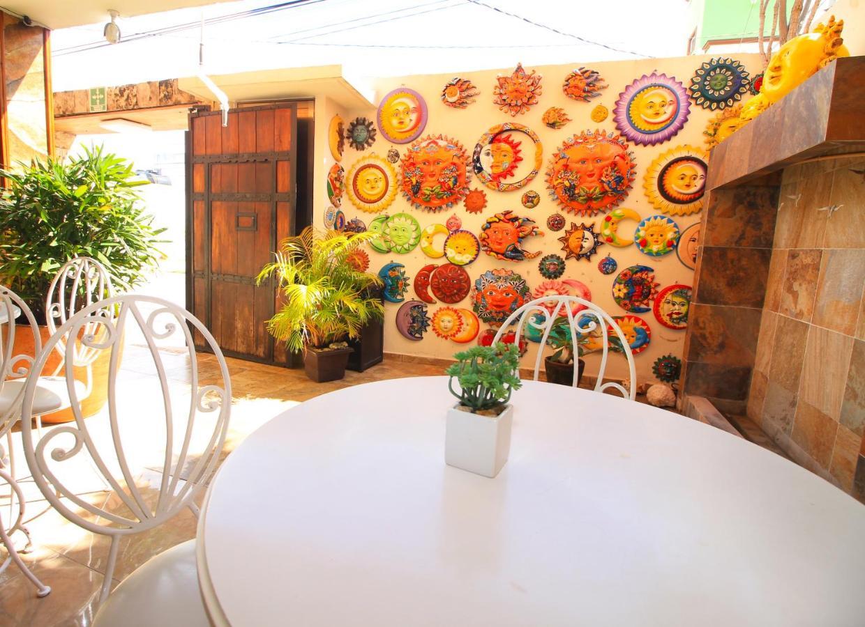 Papagayo Hotel Boutique Playa del Carmen Eksteriør billede A patio in the center of the house