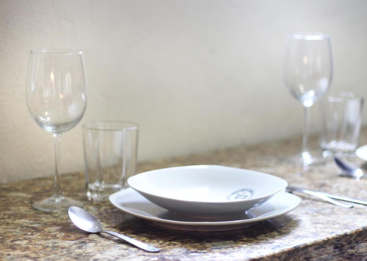 Papagayo Hotel Boutique Playa del Carmen Eksteriør billede Place setting with a soup bowl