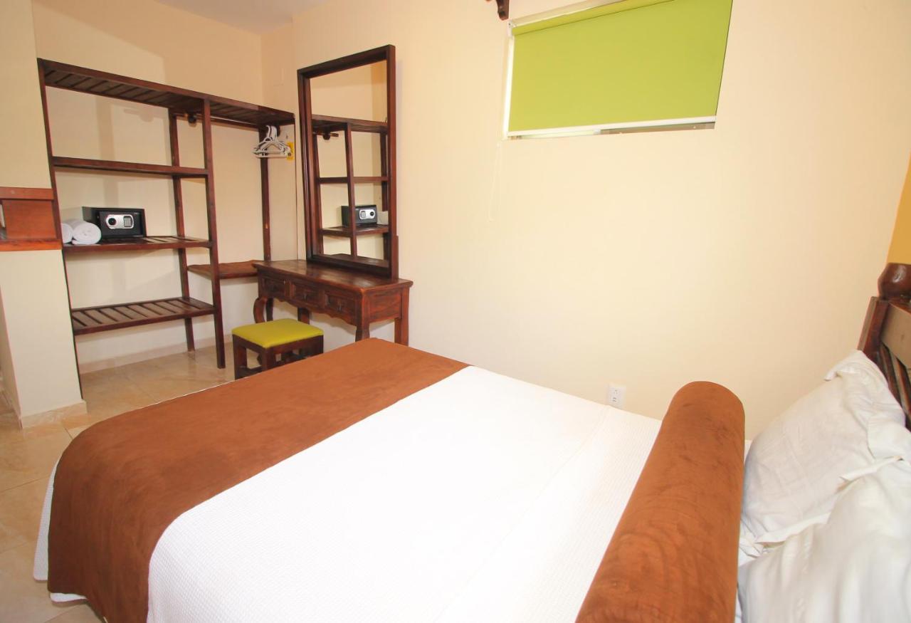 Papagayo Hotel Boutique Playa del Carmen Eksteriør billede A bedroom at the hotel